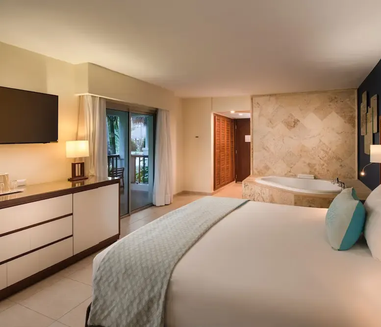 Junior Suite Premium Tropical View with Jacuzzi at Impressive Premium Punta Cana — photo supplied by the resort