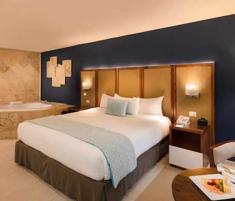 Junior Suite Premium Tropical View with Jacuzzi at Impressive Premium Punta Cana — photo supplied by the resort