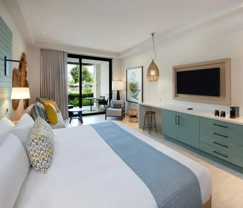 Resort King - Pool View Junior Suite at Lopesan Costa Bavaro Resort, Spa & Casino — photo supplied by the resort