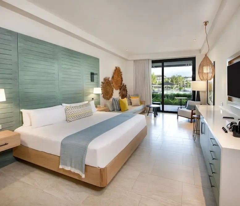 Resort King - Pool View Junior Suite at Lopesan Costa Bavaro Resort, Spa & Casino — photo supplied by the resort