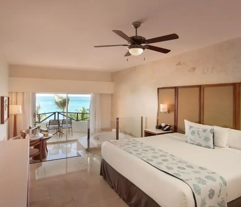 Junior Suite Premium Ocean Front with Jacuzzi at Impressive Premium Punta Cana — photo supplied by the resort