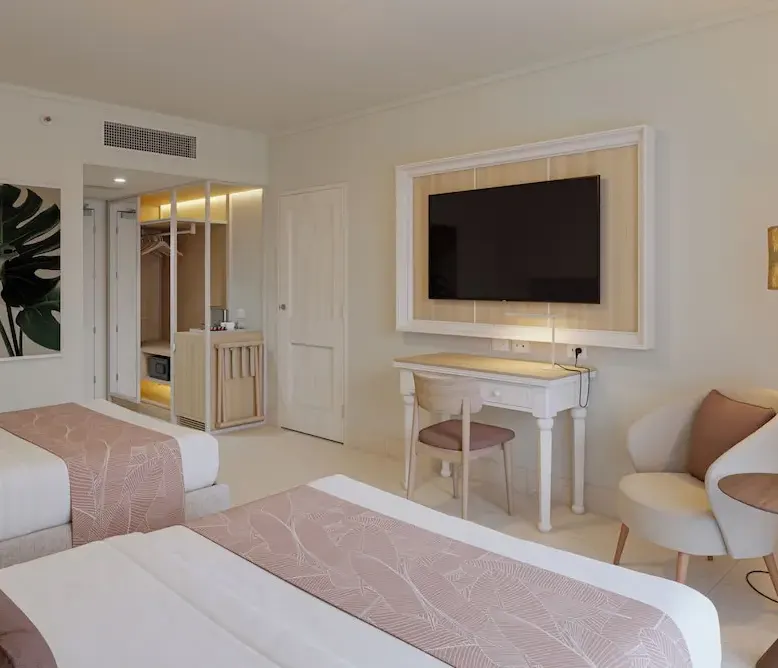 Club Room, 2 Double Beds (Tropical View) at Wyndham Alltra Punta Cana — photo supplied by the resort