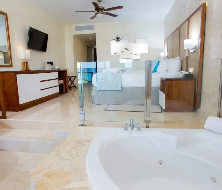Junior Suite Premium Ocean View with Jacuzzi at Impressive Premium Punta Cana — photo supplied by the resort