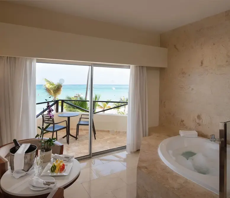 Junior Suite Premium Ocean View with Jacuzzi at Impressive Premium Punta Cana — photo supplied by the resort