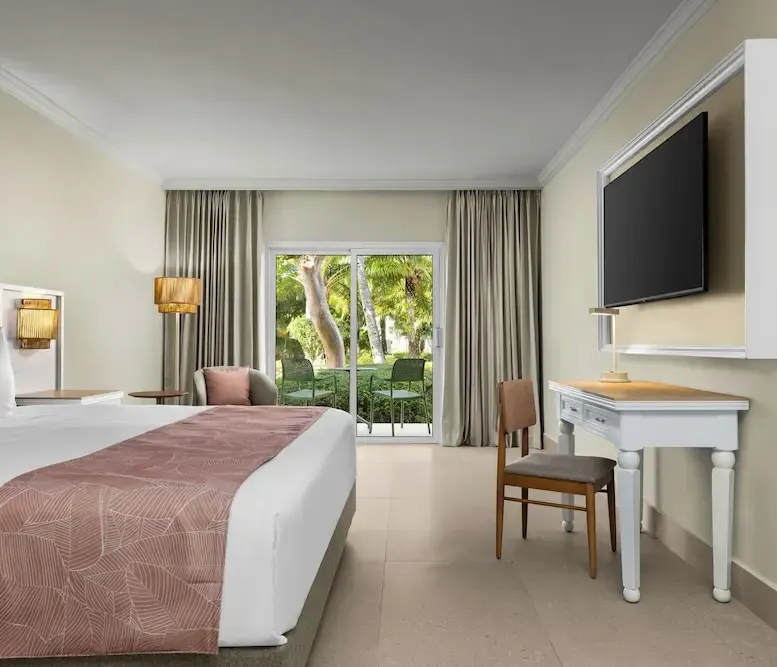 Club Room, 1 King Bed (Tropical View) at Wyndham Alltra Punta Cana — photo supplied by the resort