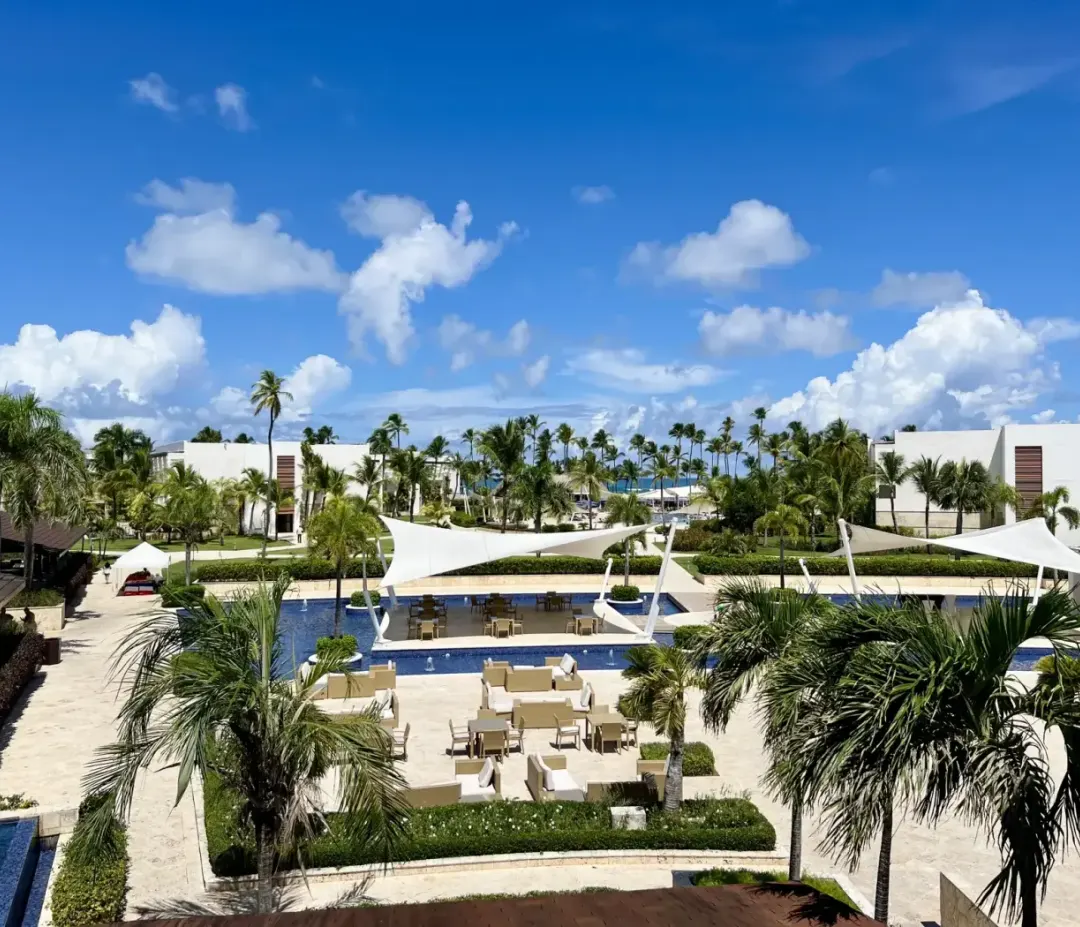 The gardens and pool at the Hideaway at Royalton Punta Cana, seen from the path.