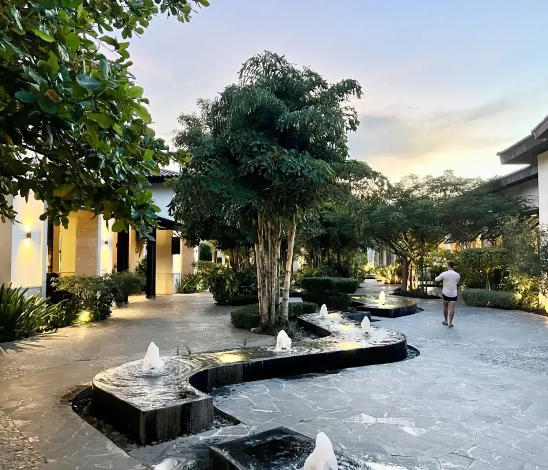 The gardens and water channels at Lopesan Costa Bávaro at dusk.