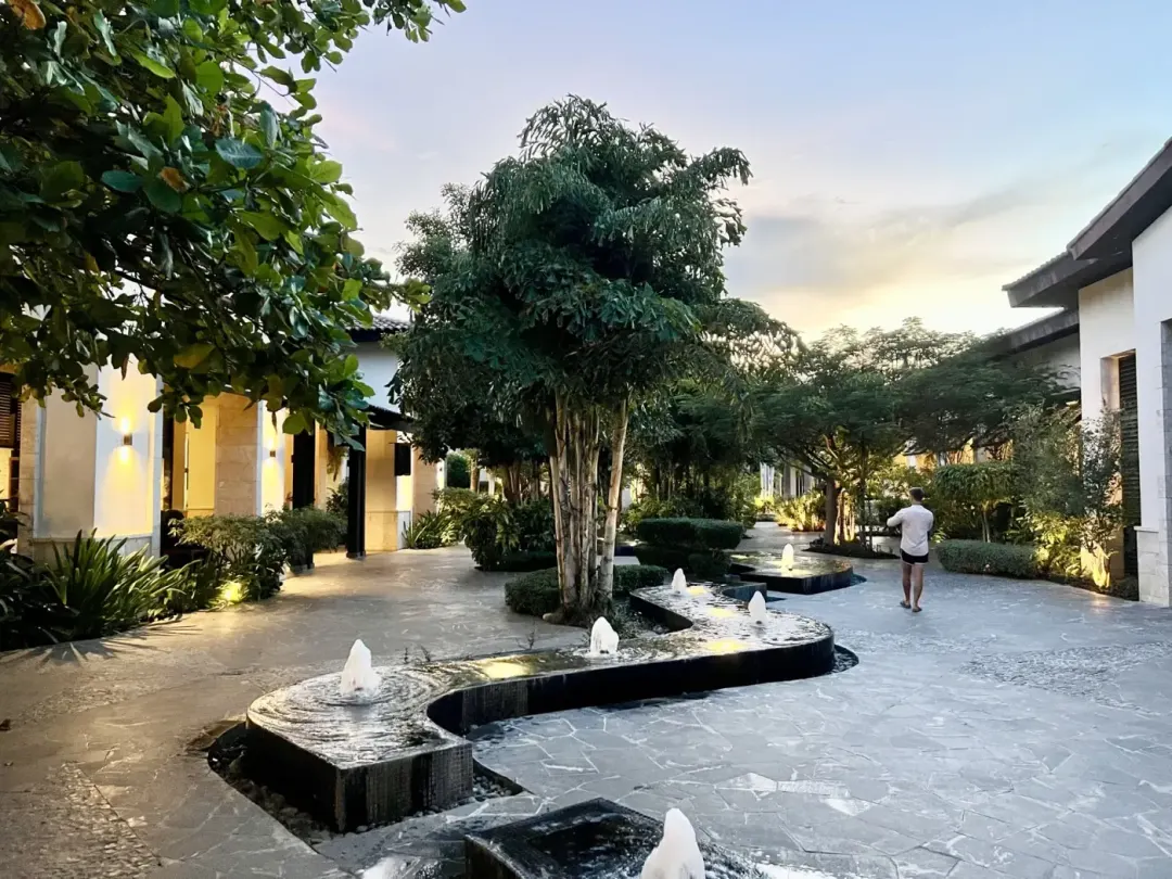 The gardens and water channels at Lopesan Costa Bávaro at dusk.