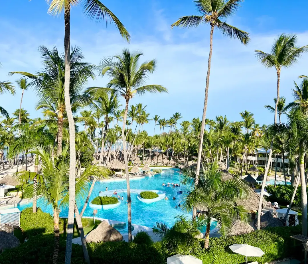The main pool at Meliá Punta Cana Beach, empty at eight in the morning.