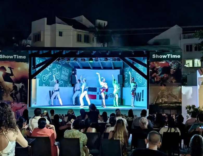 stage with performers, audience watching, ShowTime banners