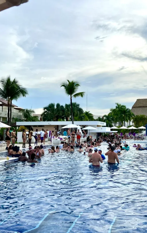 The main pool on a Saturday afternoon, full of people, our photo.