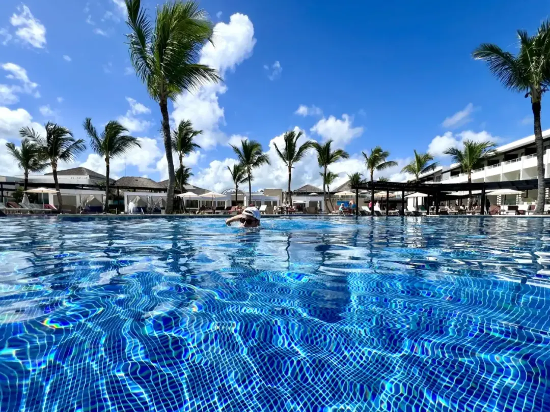 The main pool at Royalton CHIC Punta Cana in the middle of the day.