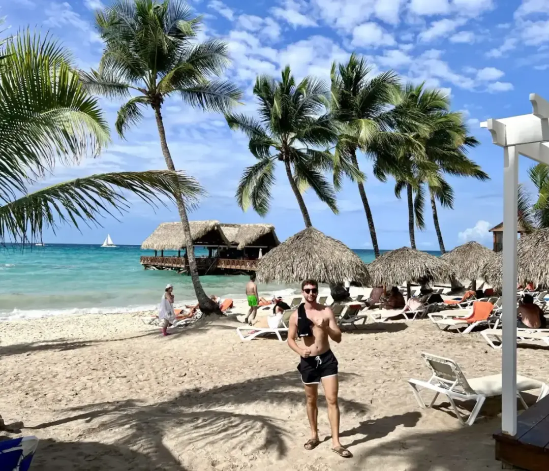 The beach at Sunscape Dominicus La Romana, loungers under the palms.
